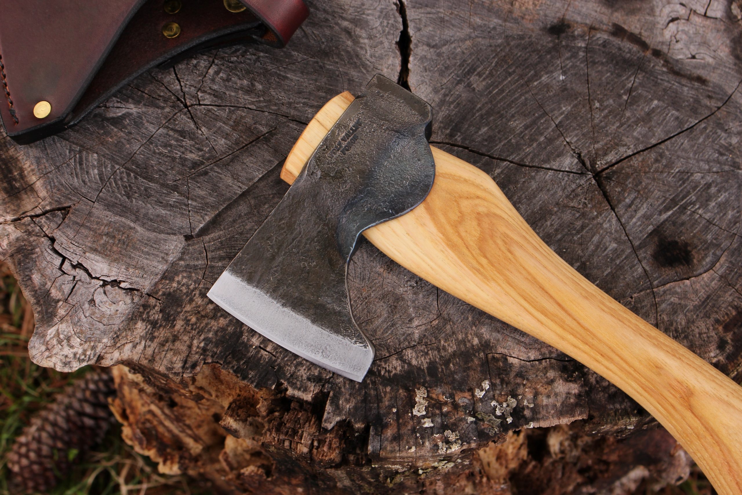 handmade, usa made, usa made axe, hatchet, chopping, wood chopping, outdoor, outdoorsman, survival, backwoodsman, hickory, axe made in america, axes made in the usa, ike bullington, wolf valley forge, valley forge, pack axe, back packing, camping, trail axe, hunting axe, trappers axe, camp axe, bush axe, belt axe, pack axe, leather shoulder rig, chopping axe, leather axe carrier, shoulder sling for axe, carpenter's axe, Wolf Valley Forge, Wolf Valley Forge axe release, Axe Wax, haversack, go back, man purse, man bag, canvas bag, reenactor, reenacting