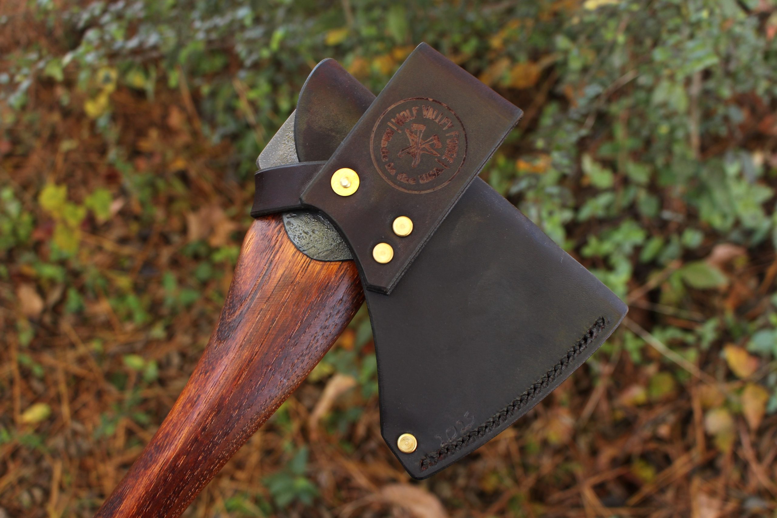 handmade, usa made, usa made axe, hatchet, chopping, wood chopping, outdoor, outdoorsman, survival, backwoodsman, hickory, axe made in america, axes made in the usa, ike bullington, wolf valley forge, valley forge, pack axe, back packing, camping, trail axe, hunting axe, trappers axe, camp axe, bush axe, belt axe, pack axe, leather shoulder rig, chopping axe, leather axe carrier, shoulder sling for axe, carpenter's axe, Wolf Valley Forge, Wolf Valley Forge axe release, Axe Wax, haversack, go back, man purse, man bag, canvas bag, reenactor, reenacting