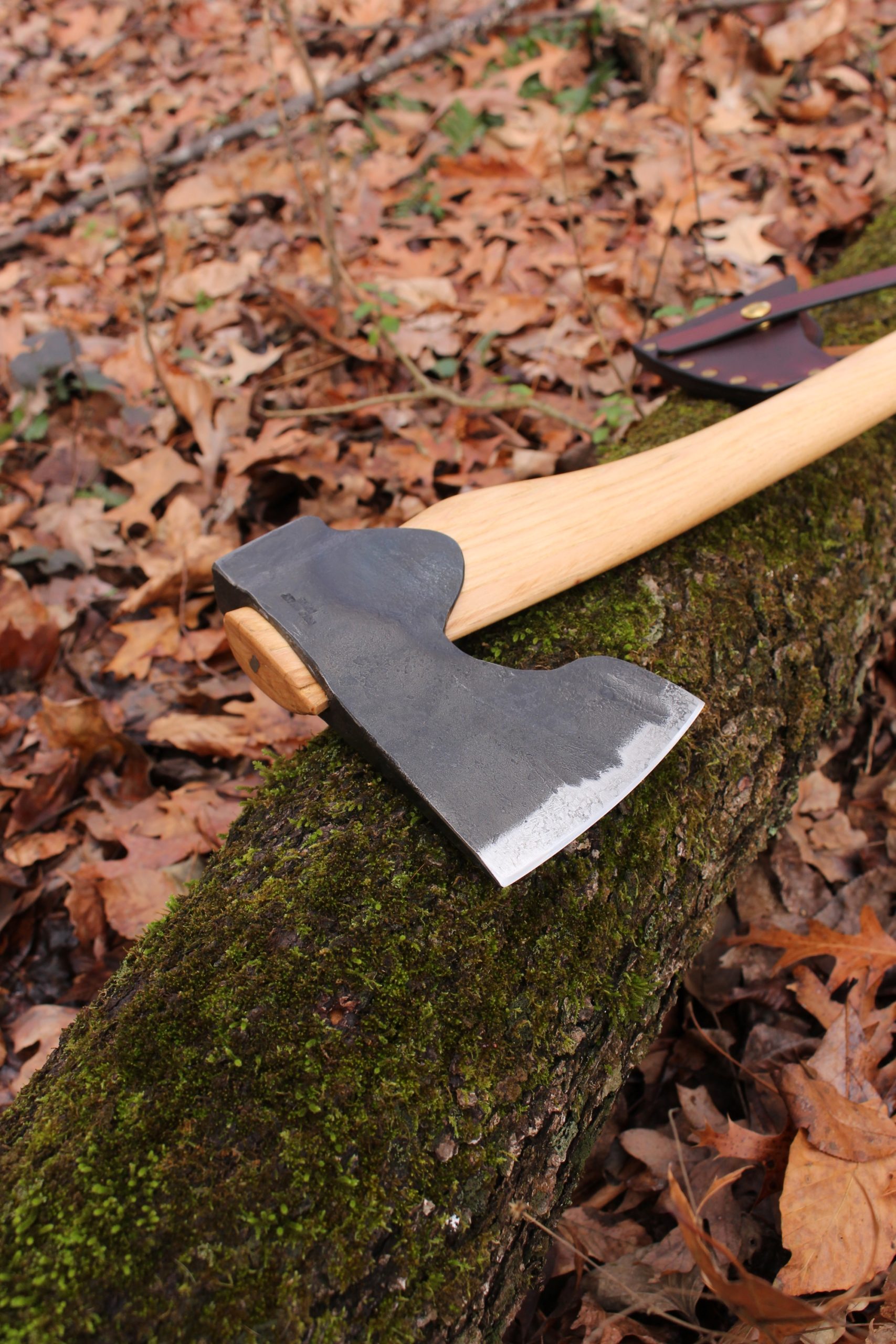 handmade, usa made, usa made axe, hatchet, chopping, wood chopping, outdoor, outdoorsman, survival, backwoodsman, hickory, axe made in america, axes made in the usa, ike bullington, wolf valley forge, valley forge, pack axe, back packing, camping, trail axe, hunting axe, trappers axe, camp axe, bush axe, belt axe, pack axe, leather shoulder rig, chopping axe, leather axe carrier, shoulder sling for axe, carpenter's axe, Wolf Valley Forge, Wolf Valley Forge axe release, Axe Wax, haversack, go back, man purse, man bag, canvas bag, reenactor, reenacting, Trekker Axe, Axe Life