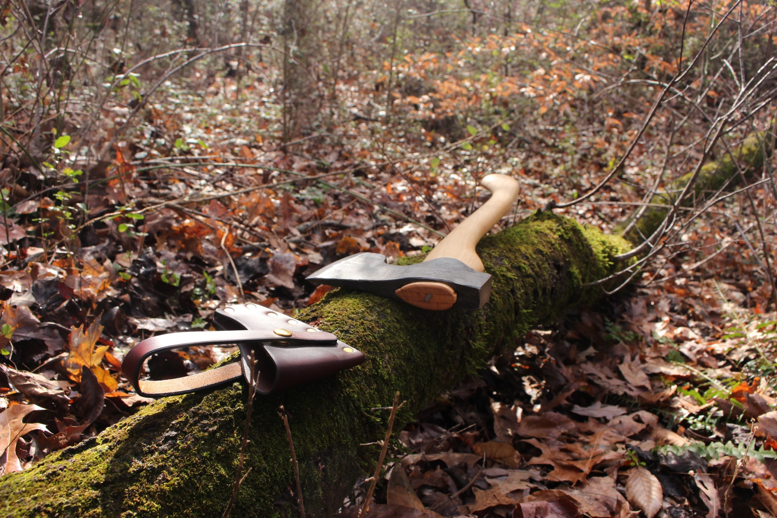 handmade, usa made, usa made axe, hatchet, chopping, wood chopping, outdoor, outdoorsman, survival, backwoodsman, hickory, axe made in america, axes made in the usa, ike bullington, wolf valley forge, valley forge, pack axe, back packing, camping, trail axe, hunting axe, trappers axe, camp axe, bush axe, belt axe, pack axe, leather shoulder rig, chopping axe, leather axe carrier, shoulder sling for axe, carpenter's axe, Wolf Valley Forge, Wolf Valley Forge axe release, Axe Wax, haversack, go back, man purse, man bag, canvas bag, reenactor, reenacting, Trekker Axe, Axe Life