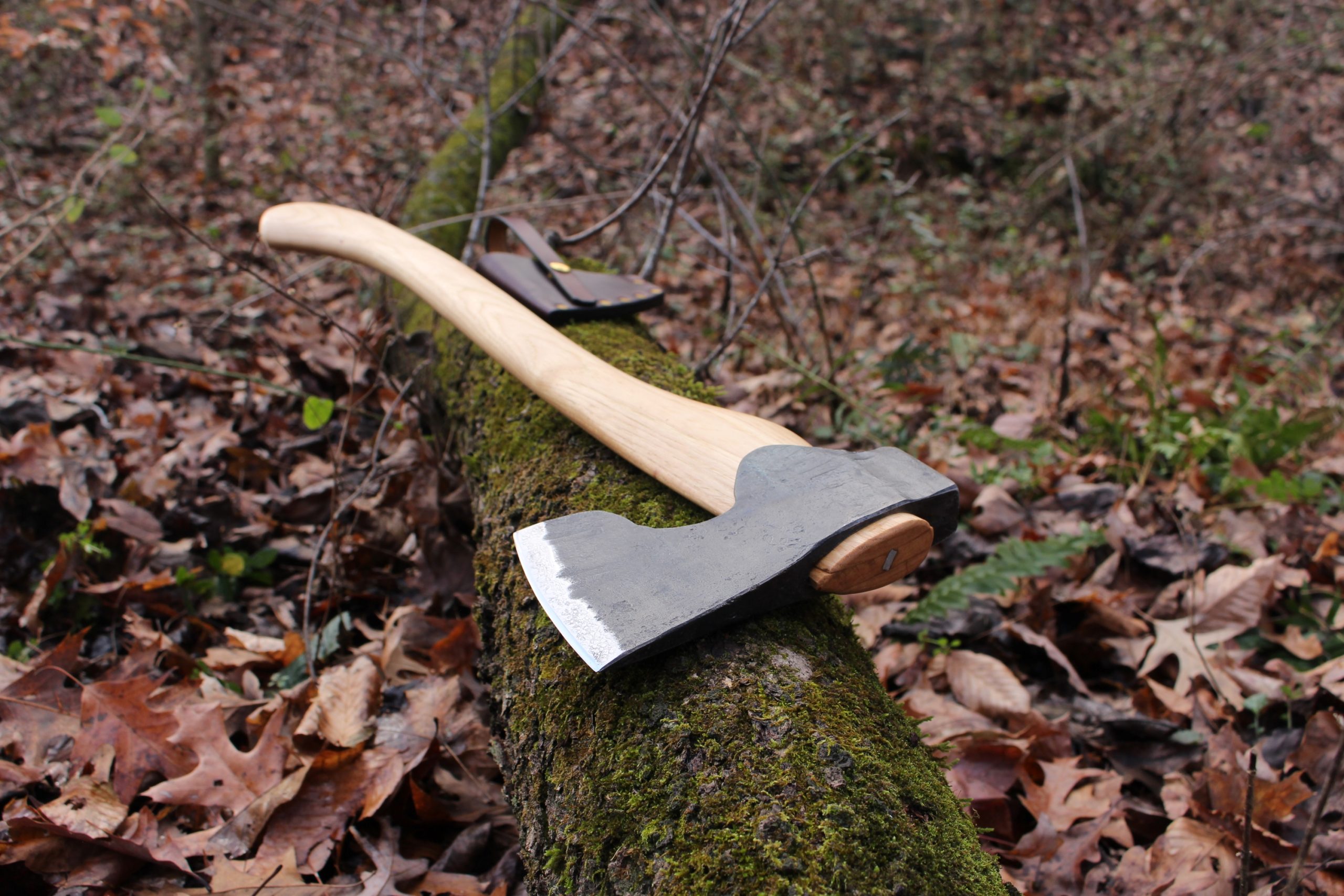 handmade, usa made, usa made axe, hatchet, chopping, wood chopping, outdoor, outdoorsman, survival, backwoodsman, hickory, axe made in america, axes made in the usa, ike bullington, wolf valley forge, valley forge, pack axe, back packing, camping, trail axe, hunting axe, trappers axe, camp axe, bush axe, belt axe, pack axe, leather shoulder rig, chopping axe, leather axe carrier, shoulder sling for axe, carpenter's axe, Wolf Valley Forge, Wolf Valley Forge axe release, Axe Wax, haversack, go back, man purse, man bag, canvas bag, reenactor, reenacting, Trekker Axe, Axe Life