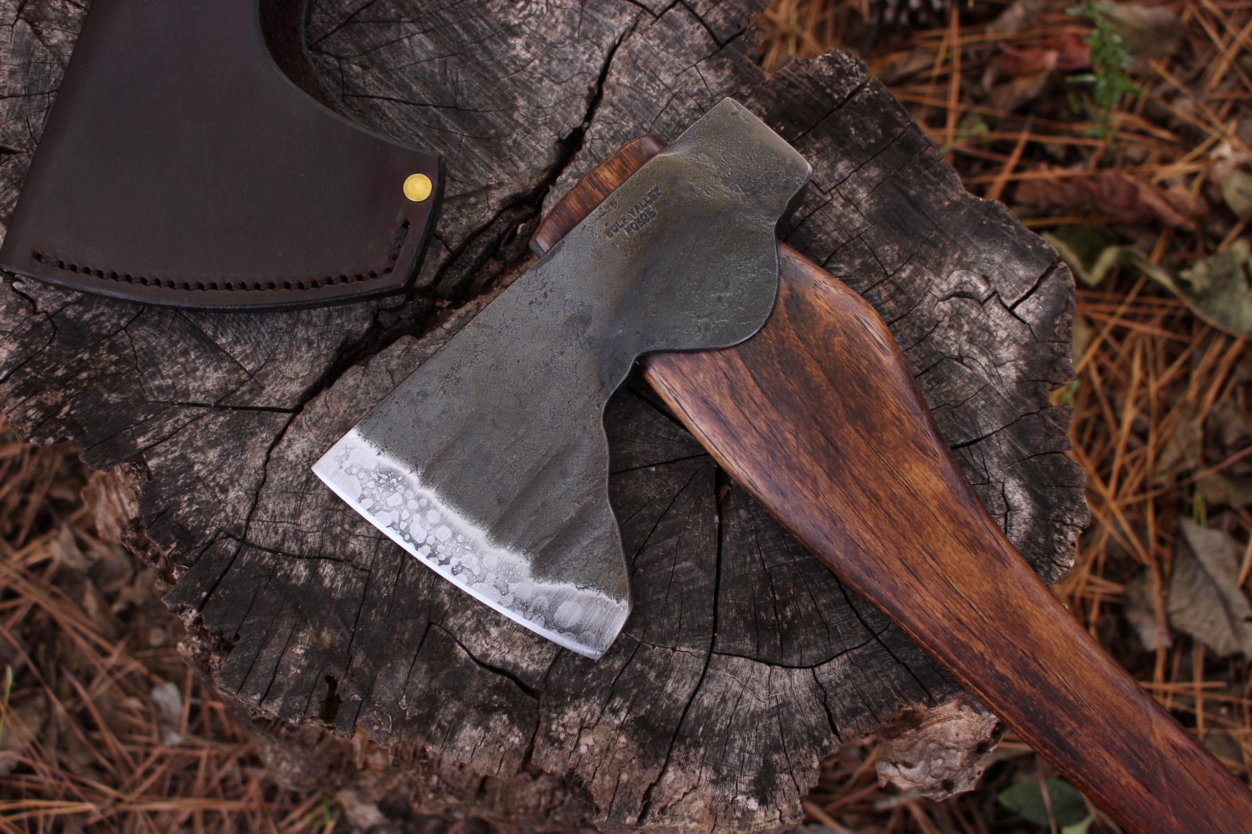 handmade, usa made, usa made axe, hatchet, chopping, wood chopping, outdoor, outdoorsman, survival, backwoodsman, hickory, axe made in america, axes made in the usa, ike bullington, wolf valley forge, valley forge, pack axe, back packing, camping, trail axe, hunting axe, trappers axe, camp axe, bush axe, belt axe, pack axe, leather shoulder rig, chopping axe, leather axe carrier, shoulder sling for axe, carpenter's axe, Wolf Valley Forge, Wolf Valley Forge axe release, Axe Wax, haversack, go back, man purse, man bag, canvas bag, reenactor, reenacting, handforged