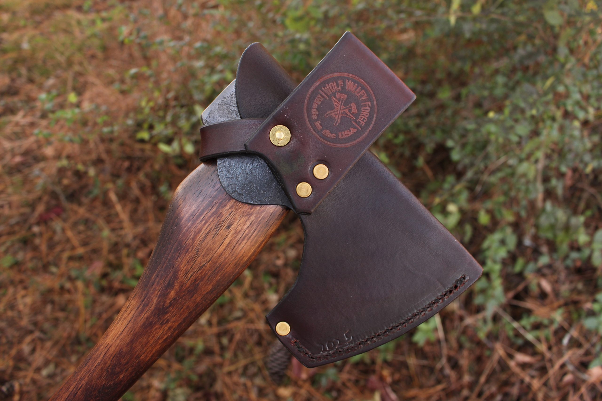 handmade, usa made, usa made axe, hatchet, chopping, wood chopping, outdoor, outdoorsman, survival, backwoodsman, hickory, axe made in america, axes made in the usa, ike bullington, wolf valley forge, valley forge, pack axe, back packing, camping, trail axe, hunting axe, trappers axe, camp axe, bush axe, belt axe, pack axe, leather shoulder rig, chopping axe, leather axe carrier, shoulder sling for axe, carpenter's axe, Wolf Valley Forge, Wolf Valley Forge axe release, Axe Wax, haversack, go back, man purse, man bag, canvas bag, reenactor, reenacting, handforged