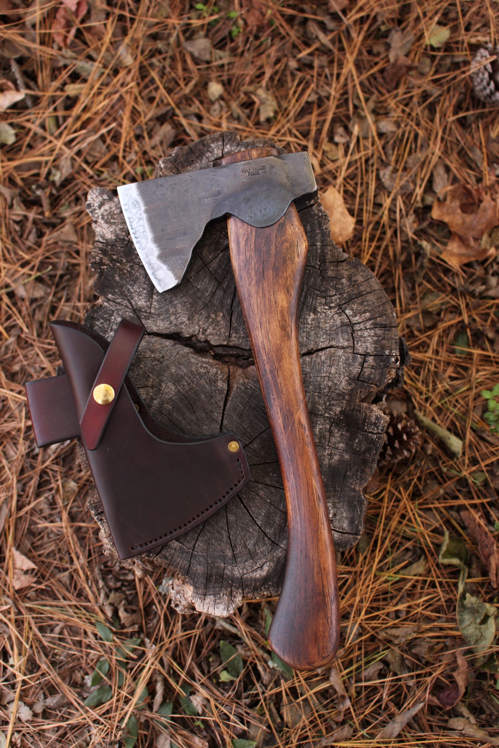 handmade, usa made, usa made axe, hatchet, chopping, wood chopping, outdoor, outdoorsman, survival, backwoodsman, hickory, axe made in america, axes made in the usa, ike bullington, wolf valley forge, valley forge, pack axe, back packing, camping, trail axe, hunting axe, trappers axe, camp axe, bush axe, belt axe, pack axe, leather shoulder rig, chopping axe, leather axe carrier, shoulder sling for axe, carpenter's axe, Wolf Valley Forge, Wolf Valley Forge axe release, Axe Wax, haversack, go back, man purse, man bag, canvas bag, reenactor, reenacting, handforged