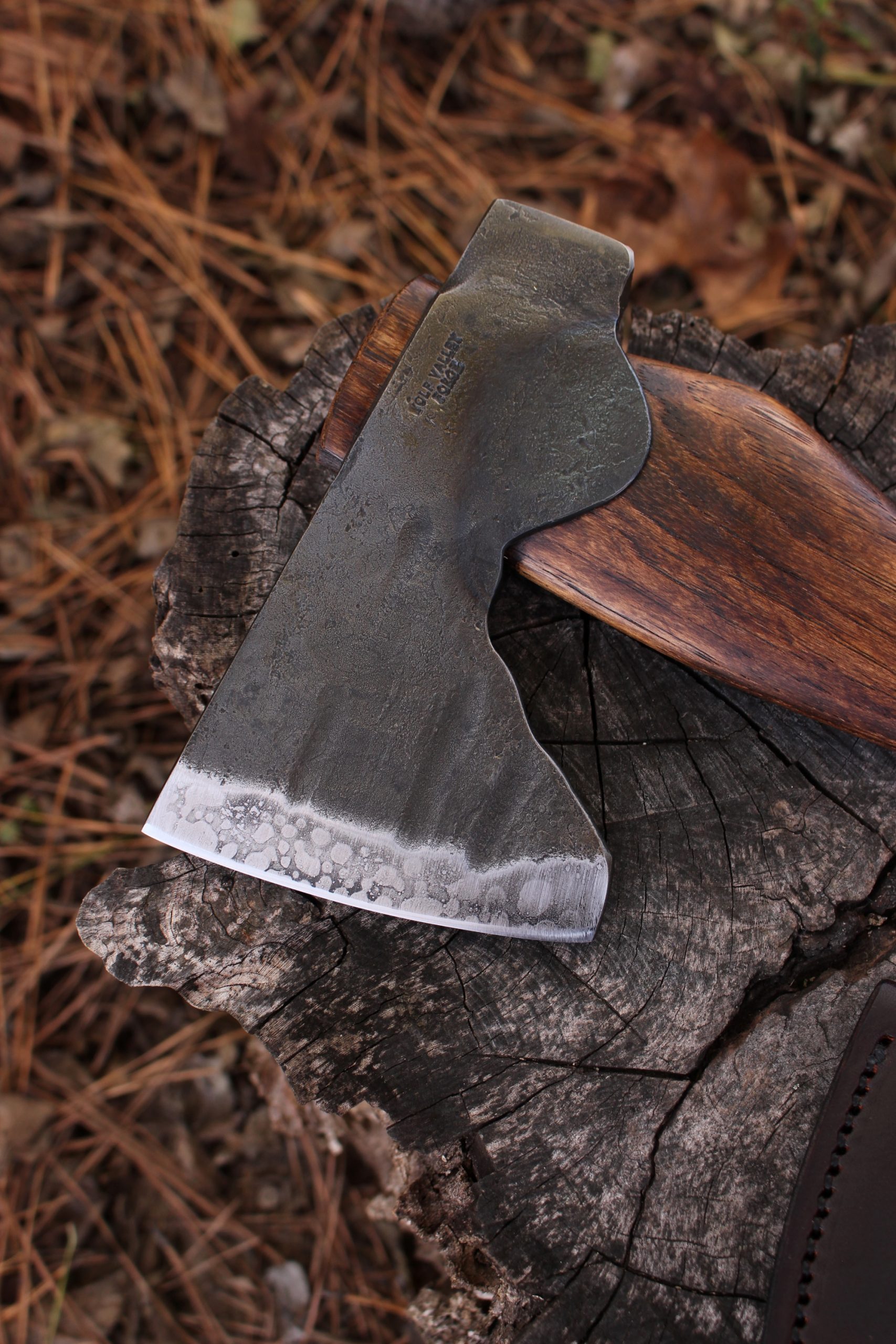 handmade, usa made, usa made axe, hatchet, chopping, wood chopping, outdoor, outdoorsman, survival, backwoodsman, hickory, axe made in america, axes made in the usa, ike bullington, wolf valley forge, valley forge, pack axe, back packing, camping, trail axe, hunting axe, trappers axe, camp axe, bush axe, belt axe, pack axe, leather shoulder rig, chopping axe, leather axe carrier, shoulder sling for axe, carpenter's axe, Wolf Valley Forge, Wolf Valley Forge axe release, Axe Wax, haversack, go back, man purse, man bag, canvas bag, reenactor, reenacting, handforged