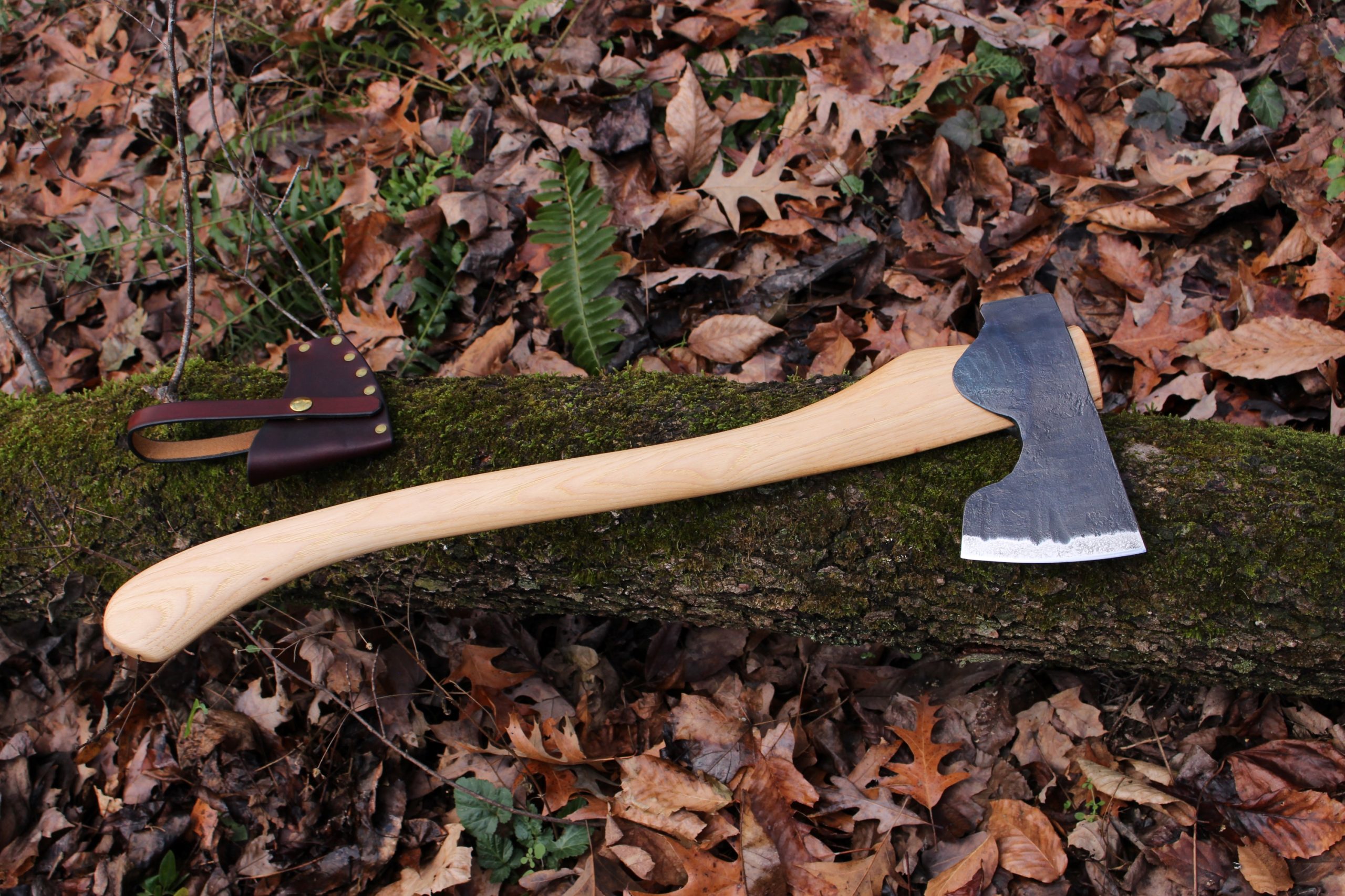 handmade, usa made, usa made axe, hatchet, chopping, wood chopping, outdoor, outdoorsman, survival, backwoodsman, hickory, axe made in america, axes made in the usa, ike bullington, wolf valley forge, valley forge, pack axe, back packing, camping, trail axe, hunting axe, trappers axe, camp axe, bush axe, belt axe, pack axe, leather shoulder rig, chopping axe, leather axe carrier, shoulder sling for axe, carpenter's axe, Wolf Valley Forge, Wolf Valley Forge axe release, Axe Wax, haversack, go back, man purse, man bag, canvas bag, reenactor, reenacting, Trekker Axe, Axe Life