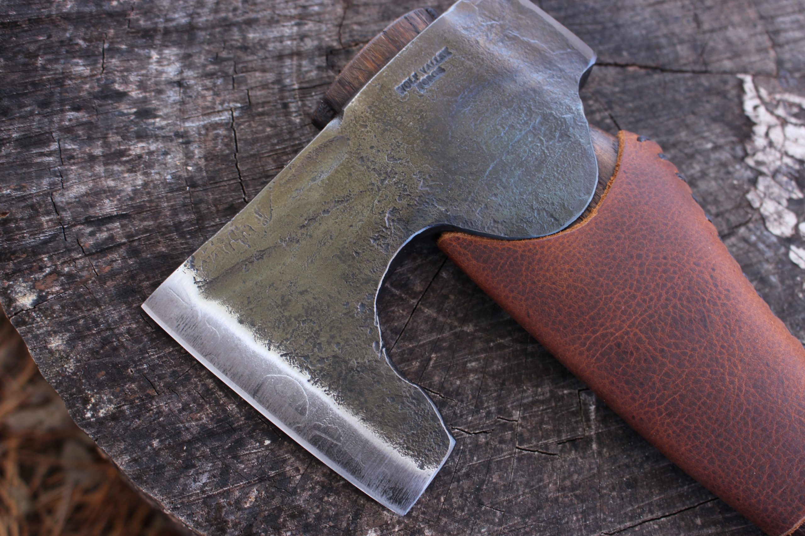 handmade, usa made, usa made axe, hatchet, chopping, wood chopping, outdoor, outdoorsman, survival, backwoodsman, hickory, axe made in america, axes made in the usa, ike bullington, wolf valley forge, valley forge, pack axe, back packing, camping, trail axe, hunting axe, trappers axe, camp axe, bush axe, belt axe, pack axe, leather shoulder rig, chopping axe, leather axe carrier, shoulder sling for axe, carpenter's axe, Wolf Valley Forge, Wolf Valley Forge axe release, Axe Wax, haversack, go bag, man purse, man bag, canvas bag, reenactor, reenacting, Trekker Axe, Axe Life, Splitting Wedge, Handforged, Wedge