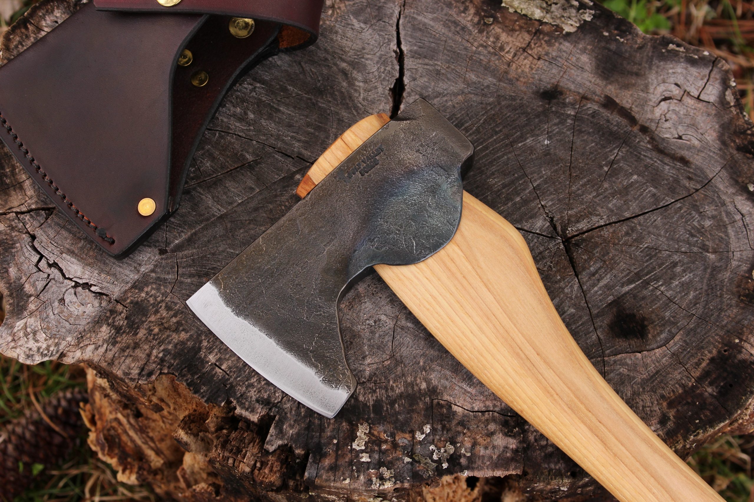 handmade, usa made, usa made axe, hatchet, chopping, wood chopping, outdoor, outdoorsman, survival, backwoodsman, hickory, axe made in america, axes made in the usa, ike bullington, wolf valley forge, valley forge, pack axe, back packing, camping, trail axe, hunting axe, trappers axe, camp axe, bush axe, belt axe, pack axe, leather shoulder rig, chopping axe, leather axe carrier, shoulder sling for axe, carpenter's axe, Wolf Valley Forge, Wolf Valley Forge axe release, Axe Wax, haversack, go bag, man purse, man bag, canvas bag, reenactor, reenacting, Trekker Axe, Axe Life, Splitting Wedge, Handforged, Wedge