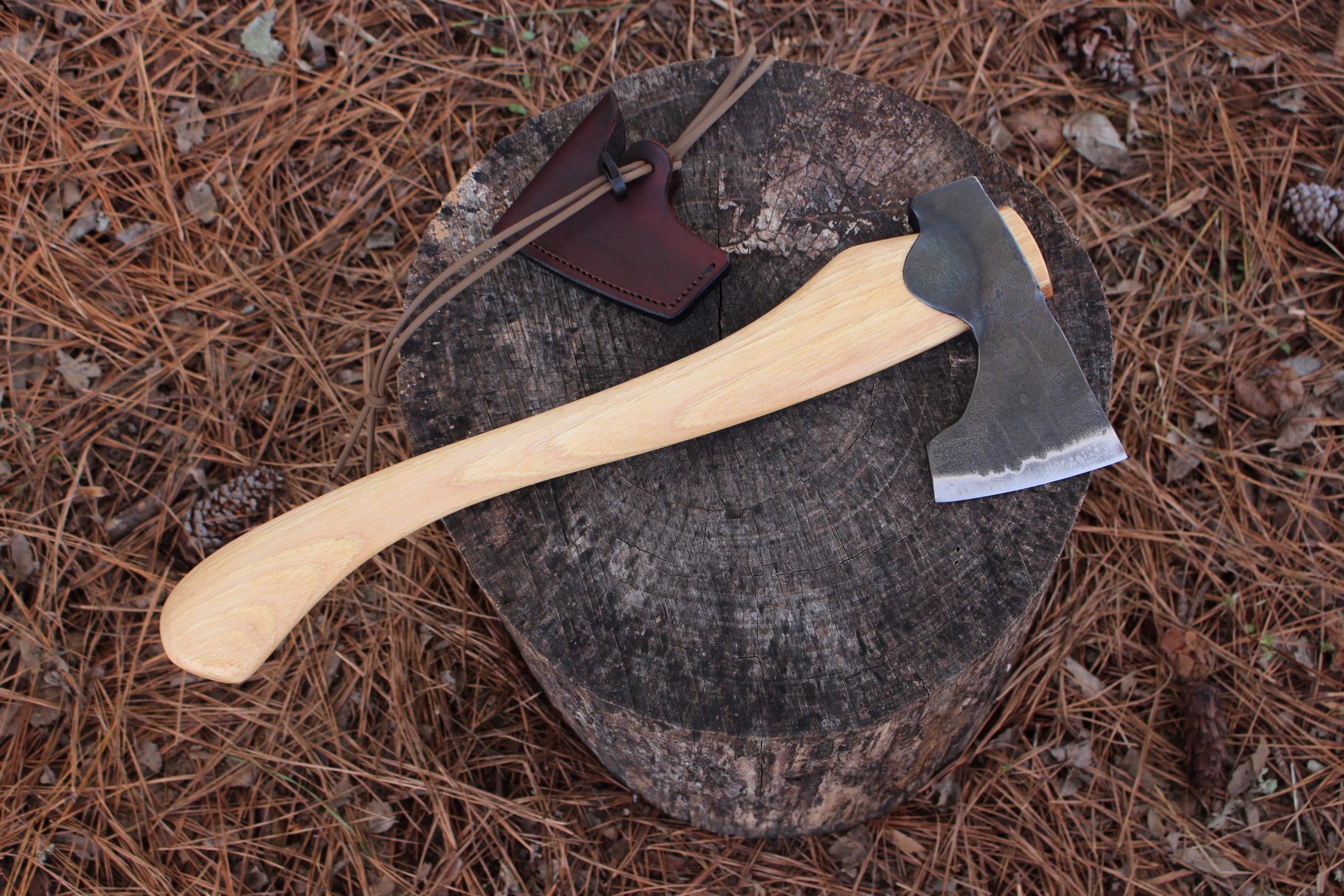 handmade, usa made, usa made axe, hatchet, chopping, wood chopping, outdoor, outdoorsman, survival, backwoodsman, hickory, axe made in america, axes made in the usa, ike bullington, wolf valley forge, valley forge, pack axe, back packing, camping, trail axe, hunting axe, trappers axe, camp axe, bush axe, belt axe, pack axe, leather shoulder rig, chopping axe, leather axe carrier, shoulder sling for axe, carpenter's axe, Wolf Valley Forge, Wolf Valley Forge axe release, Axe Wax, haversack, go back, man purse, man bag, canvas bag, reenactor, reenacting, Trekker Axe, Axe Life, handforged
