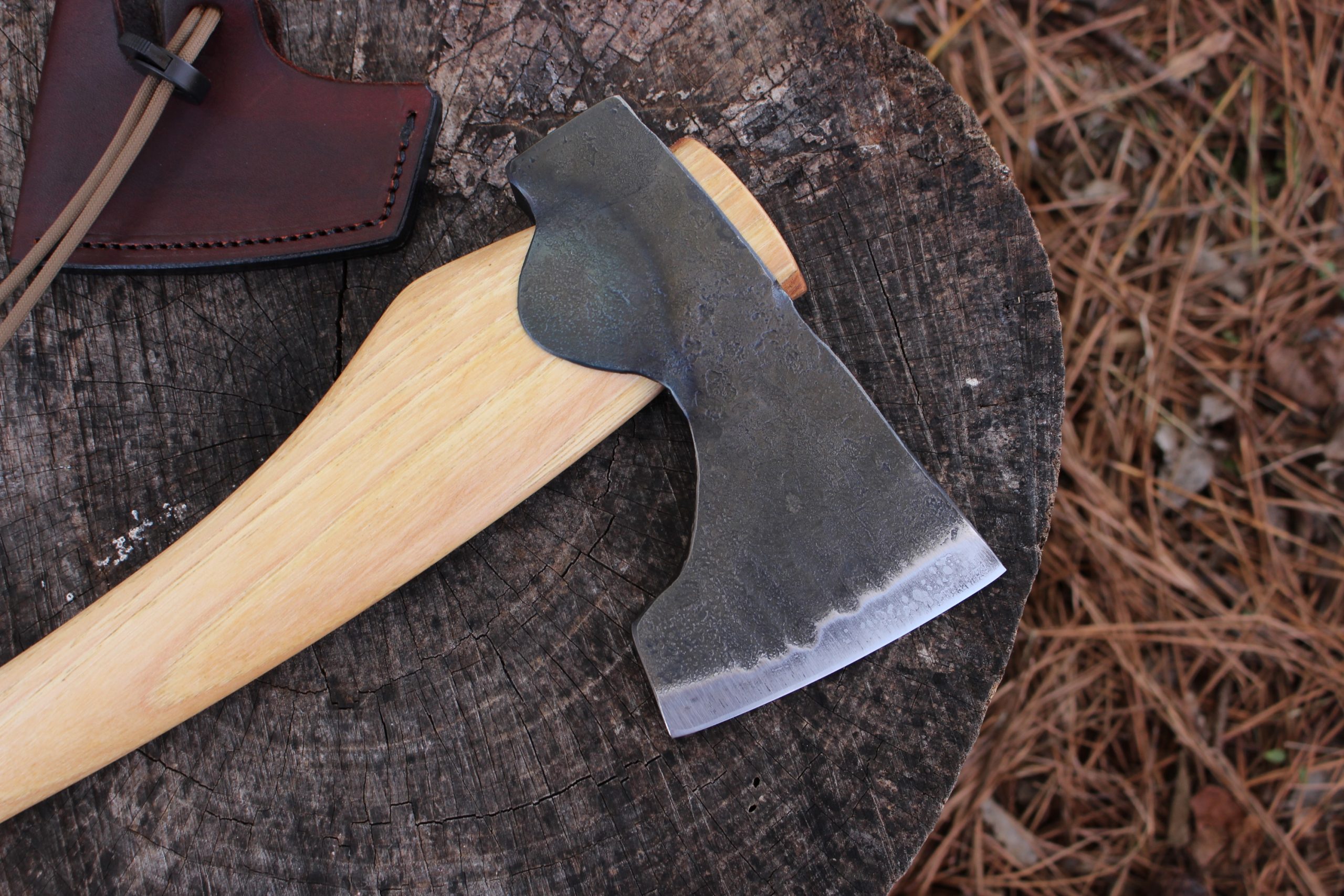 handmade, usa made, usa made axe, hatchet, chopping, wood chopping, outdoor, outdoorsman, survival, backwoodsman, hickory, axe made in america, axes made in the usa, ike bullington, wolf valley forge, valley forge, pack axe, back packing, camping, trail axe, hunting axe, trappers axe, camp axe, bush axe, belt axe, pack axe, leather shoulder rig, chopping axe, leather axe carrier, shoulder sling for axe, carpenter's axe, Wolf Valley Forge, Wolf Valley Forge axe release, Axe Wax, haversack, go back, man purse, man bag, canvas bag, reenactor, reenacting, Trekker Axe, Axe Life, handforged