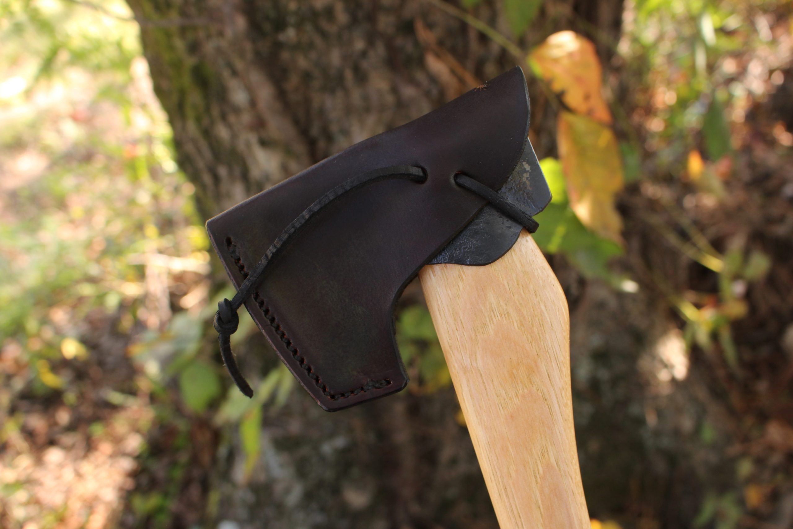 handmade, usa made, usa made axe, hatchet, chopping, wood chopping, outdoor, outdoorsman, survival, backwoodsman, hickory, axe made in america, axes made in the usa, ike bullington, wolf valley forge, valley forge, pack axe, back packing, camping, trail axe, hunting axe, trappers axe, camp axe, bush axe, belt axe, pack axe, leather shoulder rig, chopping axe, leather axe carrier, shoulder sling for axe, carpenter's axe, Wolf Valley Forge, Wolf Valley Forge axe release, Axe Wax, haversack, go back, man purse, man bag, canvas bag, reenactor, reenacting, Trekker Axe, Axe Life
