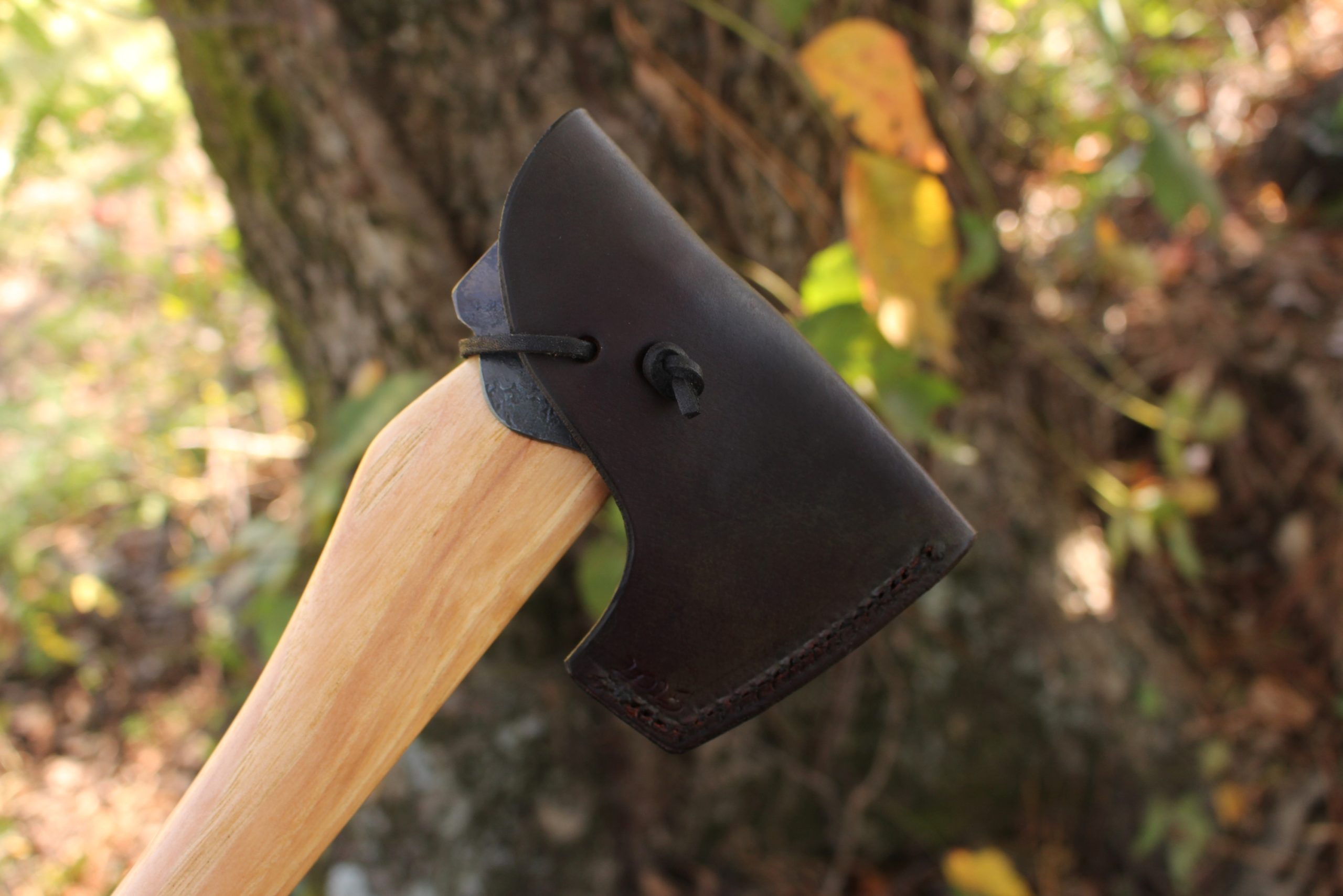 handmade, usa made, usa made axe, hatchet, chopping, wood chopping, outdoor, outdoorsman, survival, backwoodsman, hickory, axe made in america, axes made in the usa, ike bullington, wolf valley forge, valley forge, pack axe, back packing, camping, trail axe, hunting axe, trappers axe, camp axe, bush axe, belt axe, pack axe, leather shoulder rig, chopping axe, leather axe carrier, shoulder sling for axe, carpenter's axe, Wolf Valley Forge, Wolf Valley Forge axe release, Axe Wax, haversack, go back, man purse, man bag, canvas bag, reenactor, reenacting, Trekker Axe, Axe Life