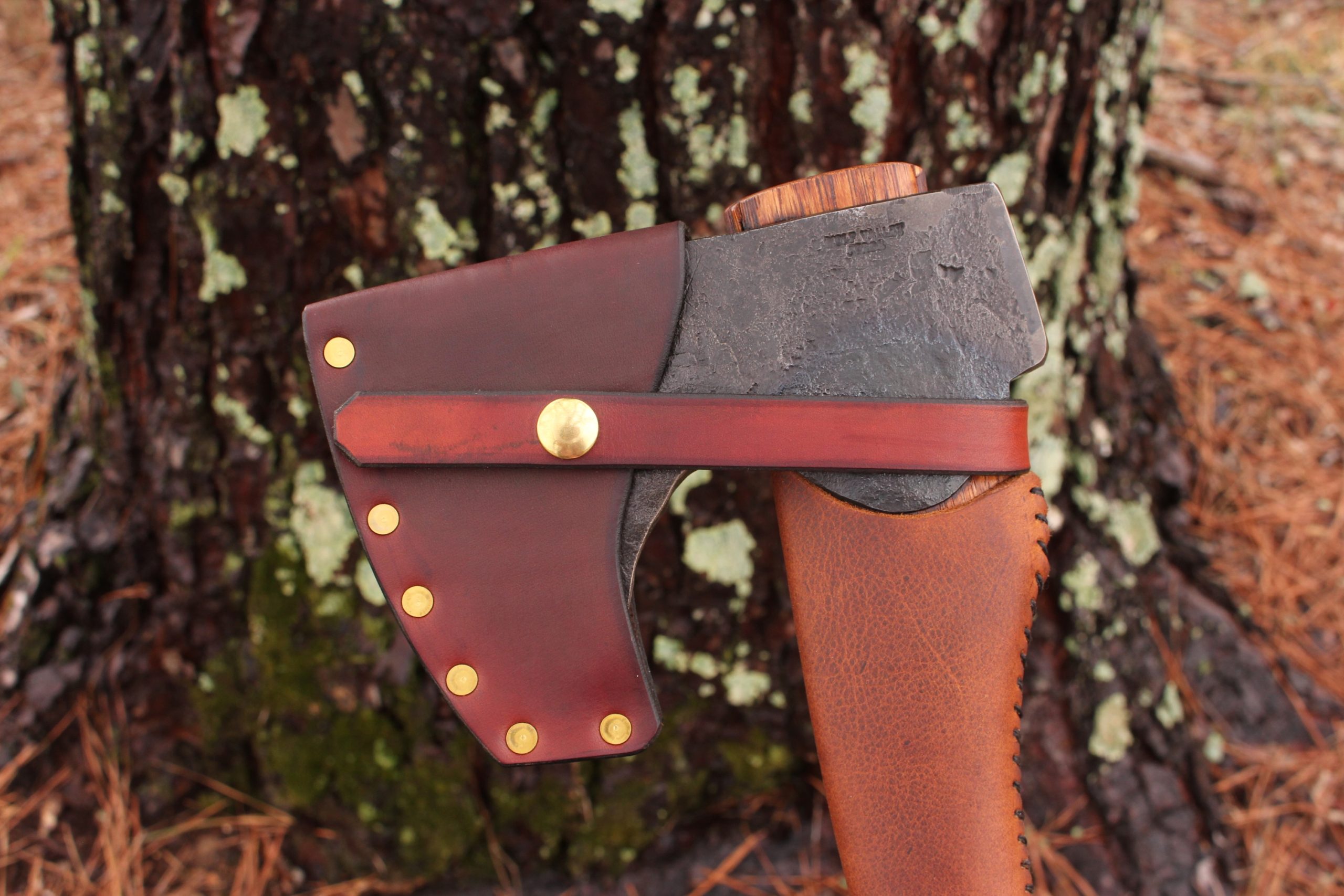 handmade, usa made, usa made axe, hatchet, chopping, wood chopping, outdoor, outdoorsman, survival, backwoodsman, hickory, axe made in america, axes made in the usa, ike bullington, wolf valley forge, valley forge, pack axe, back packing, camping, trail axe, hunting axe, trappers axe, camp axe, bush axe, belt axe, pack axe, leather shoulder rig, chopping axe, leather axe carrier, shoulder sling for axe, carpenter's axe, Wolf Valley Forge, Wolf Valley Forge axe release, Axe Wax, haversack, go back, man purse, man bag, canvas bag, reenactor, reenacting, Trekker Axe, Axe Life, handforged