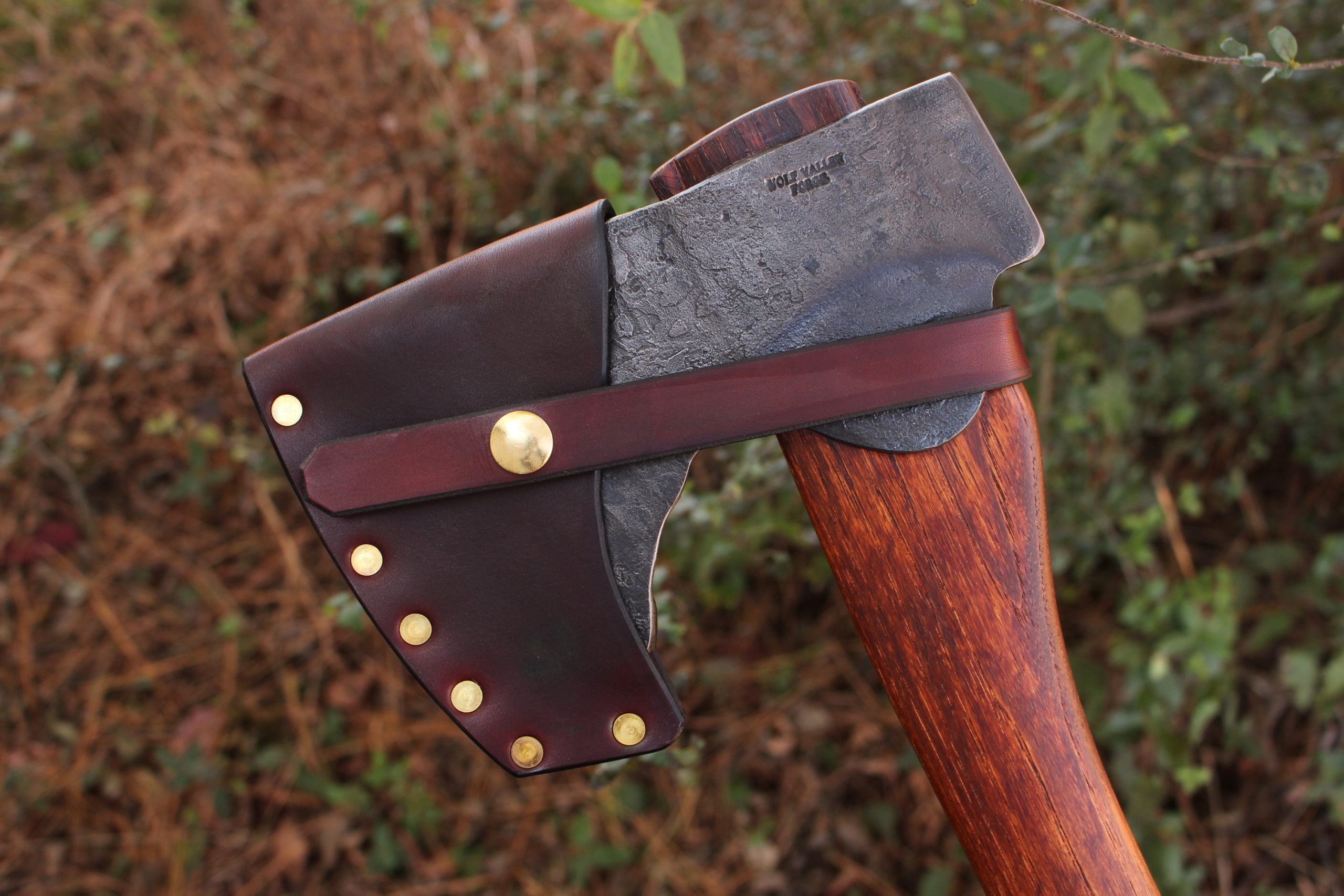 handmade, usa made, usa made axe, hatchet, chopping, wood chopping, outdoor, outdoorsman, survival, backwoodsman, hickory, axe made in america, axes made in the usa, ike bullington, wolf valley forge, valley forge, pack axe, back packing, camping, trail axe, hunting axe, trappers axe, camp axe, bush axe, belt axe, pack axe, leather shoulder rig, chopping axe, leather axe carrier, shoulder sling for axe, carpenter's axe, Wolf Valley Forge, Wolf Valley Forge axe release, Axe Wax, haversack, go back, man purse, man bag, canvas bag, reenactor, reenacting, Trekker Axe, Axe Life