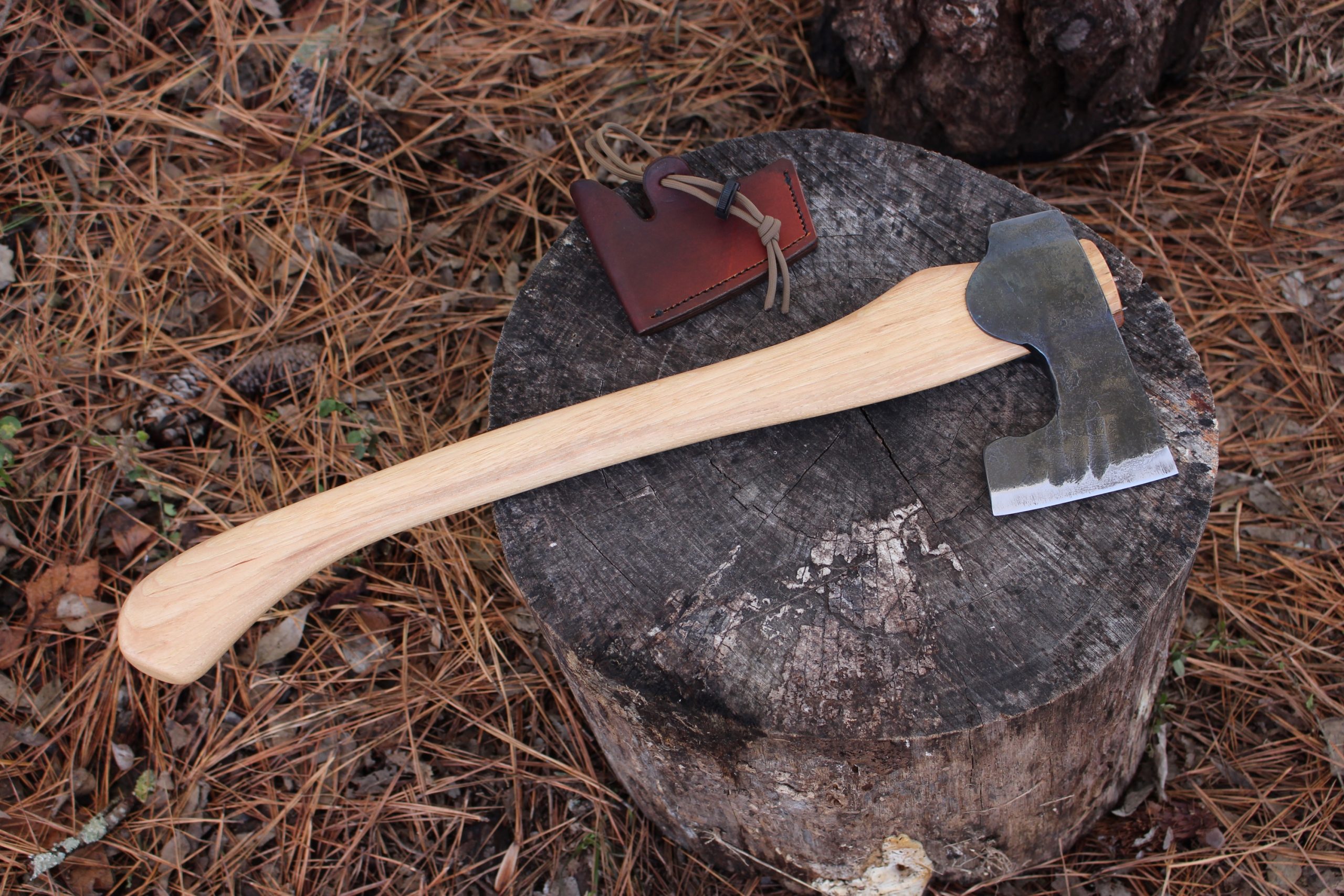handmade, usa made, usa made axe, hatchet, chopping, wood chopping, outdoor, outdoorsman, survival, backwoodsman, hickory, axe made in america, axes made in the usa, ike bullington, wolf valley forge, valley forge, pack axe, back packing, camping, trail axe, hunting axe, trappers axe, camp axe, bush axe, belt axe, pack axe, leather shoulder rig, chopping axe, leather axe carrier, shoulder sling for axe, carpenter's axe, Wolf Valley Forge, Wolf Valley Forge axe release, Axe Wax, haversack, go back, man purse, man bag, canvas bag, reenactor, reenacting, Trekker Axe, Axe Life