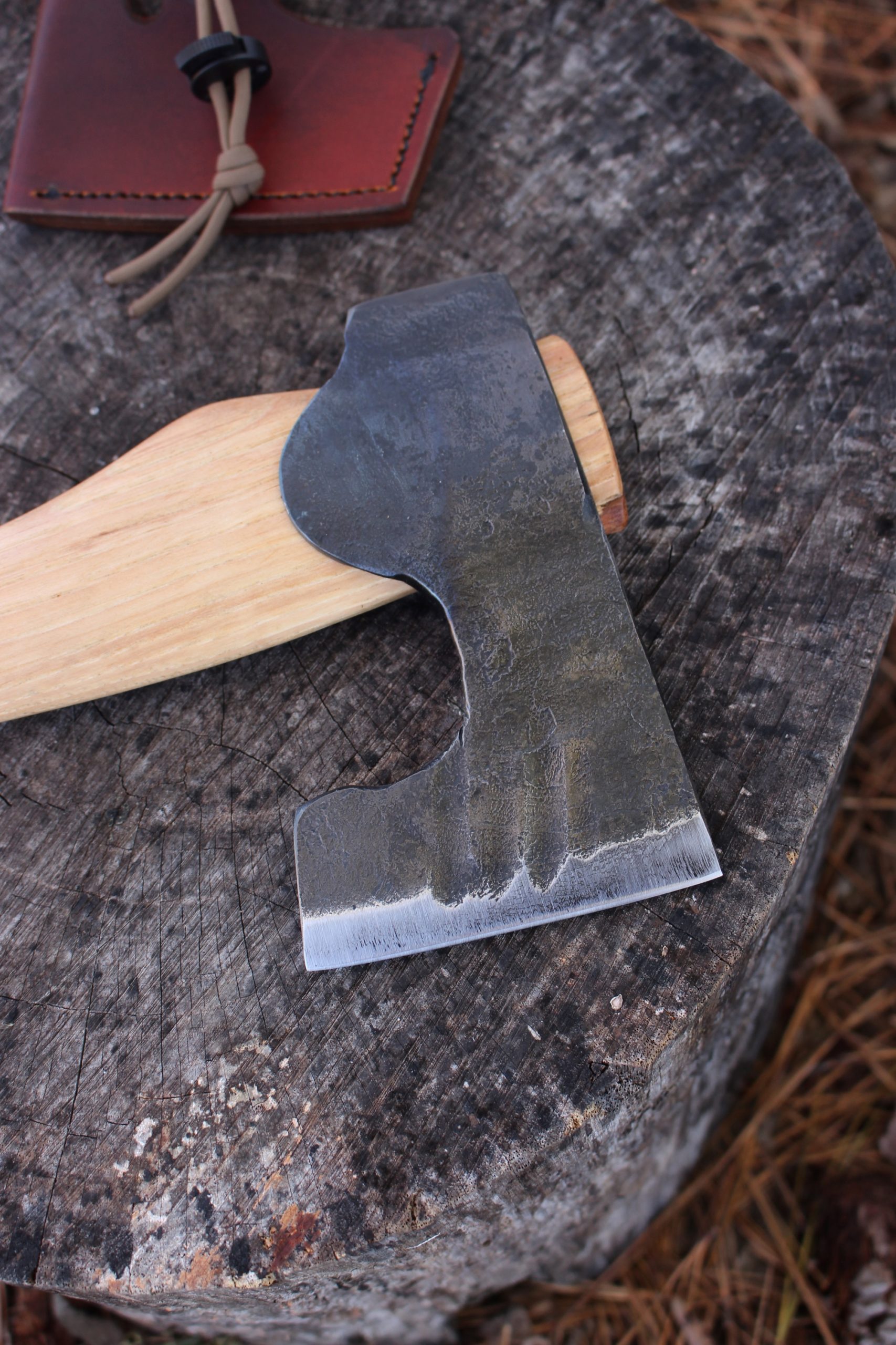 handmade, usa made, usa made axe, hatchet, chopping, wood chopping, outdoor, outdoorsman, survival, backwoodsman, hickory, axe made in america, axes made in the usa, ike bullington, wolf valley forge, valley forge, pack axe, back packing, camping, trail axe, hunting axe, trappers axe, camp axe, bush axe, belt axe, pack axe, leather shoulder rig, chopping axe, leather axe carrier, shoulder sling for axe, carpenter's axe, Wolf Valley Forge, Wolf Valley Forge axe release, Axe Wax, haversack, go back, man purse, man bag, canvas bag, reenactor, reenacting, Trekker Axe, Axe Life