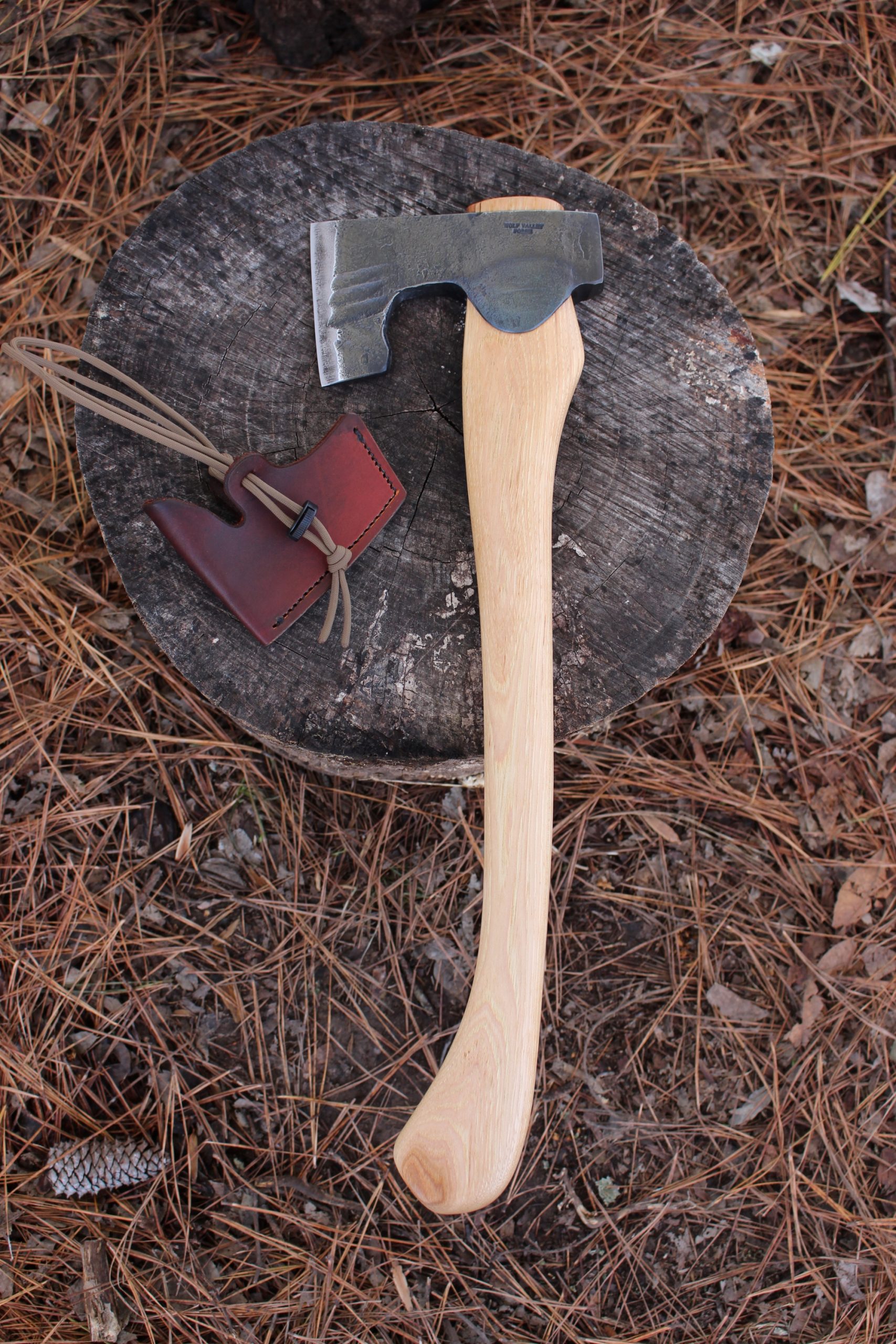 handmade, usa made, usa made axe, hatchet, chopping, wood chopping, outdoor, outdoorsman, survival, backwoodsman, hickory, axe made in america, axes made in the usa, ike bullington, wolf valley forge, valley forge, pack axe, back packing, camping, trail axe, hunting axe, trappers axe, camp axe, bush axe, belt axe, pack axe, leather shoulder rig, chopping axe, leather axe carrier, shoulder sling for axe, carpenter's axe, Wolf Valley Forge, Wolf Valley Forge axe release, Axe Wax, haversack, go back, man purse, man bag, canvas bag, reenactor, reenacting, Trekker Axe, Axe Life