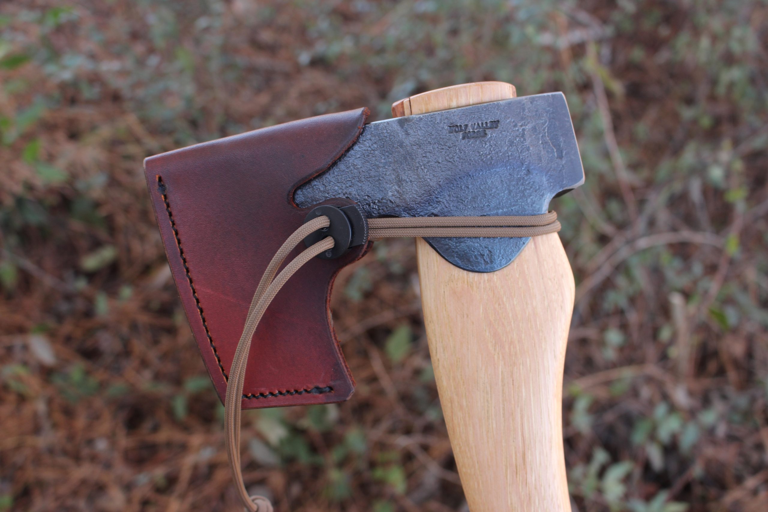 handmade, usa made, usa made axe, hatchet, chopping, wood chopping, outdoor, outdoorsman, survival, backwoodsman, hickory, axe made in america, axes made in the usa, ike bullington, wolf valley forge, valley forge, pack axe, back packing, camping, trail axe, hunting axe, trappers axe, camp axe, bush axe, belt axe, pack axe, leather shoulder rig, chopping axe, leather axe carrier, shoulder sling for axe, carpenter's axe, Wolf Valley Forge, Wolf Valley Forge axe release, Axe Wax, haversack, go back, man purse, man bag, canvas bag, reenactor, reenacting, Trekker Axe, Axe Life