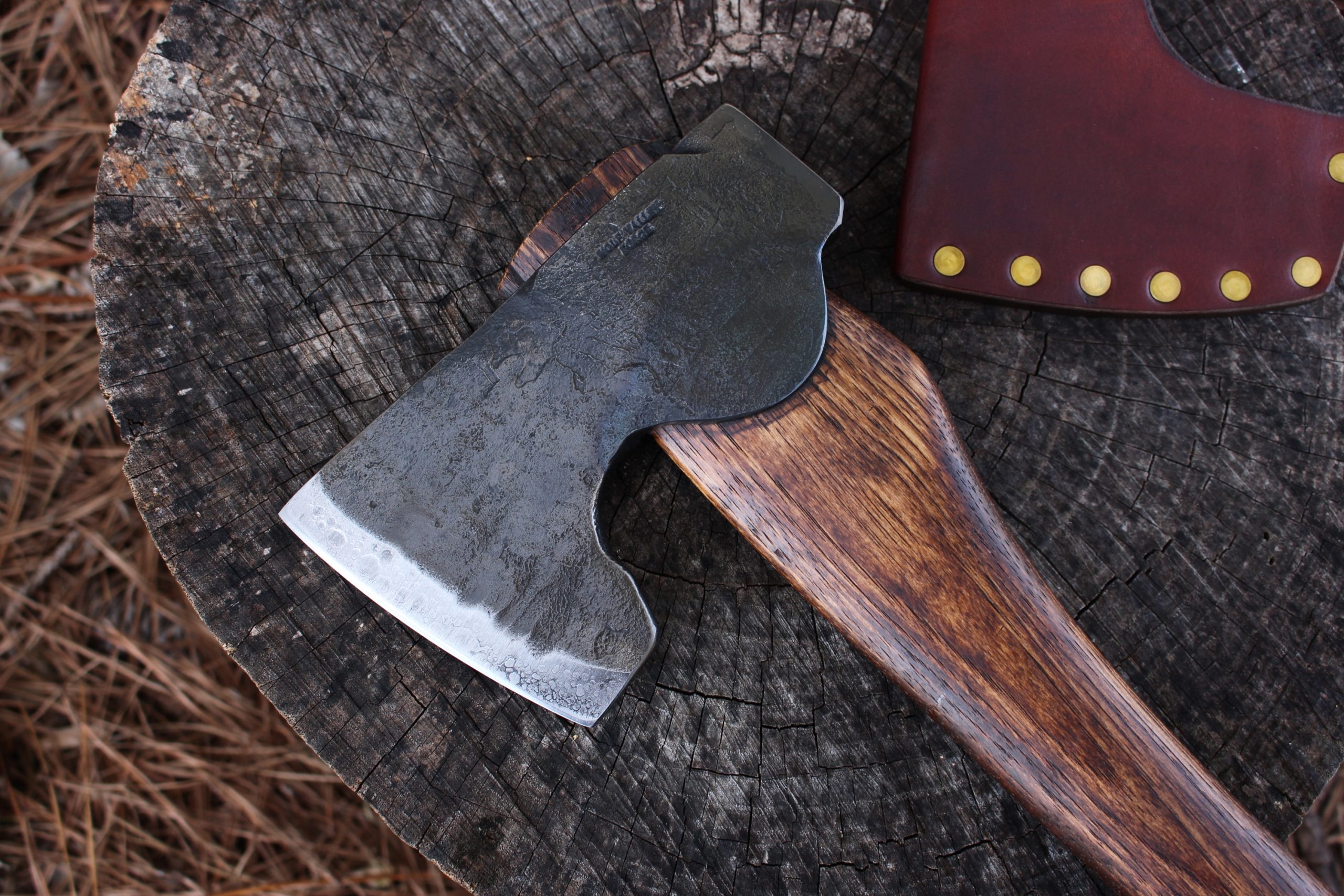 handmade, usa made, usa made axe, hatchet, chopping, wood chopping, outdoor, outdoorsman, survival, backwoodsman, hickory, axe made in america, axes made in the usa, ike bullington, wolf valley forge, valley forge, pack axe, back packing, camping, trail axe, hunting axe, trappers axe, camp axe, bush axe, belt axe, pack axe, leather shoulder rig, chopping axe, leather axe carrier, shoulder sling for axe, carpenter's axe, Wolf Valley Forge, Wolf Valley Forge axe release, Axe Wax, haversack, go bag, man purse, man bag, canvas bag, reenactor, reenacting, Trekker Axe, Axe Life, Splitting Wedge, Handforged, Wedge