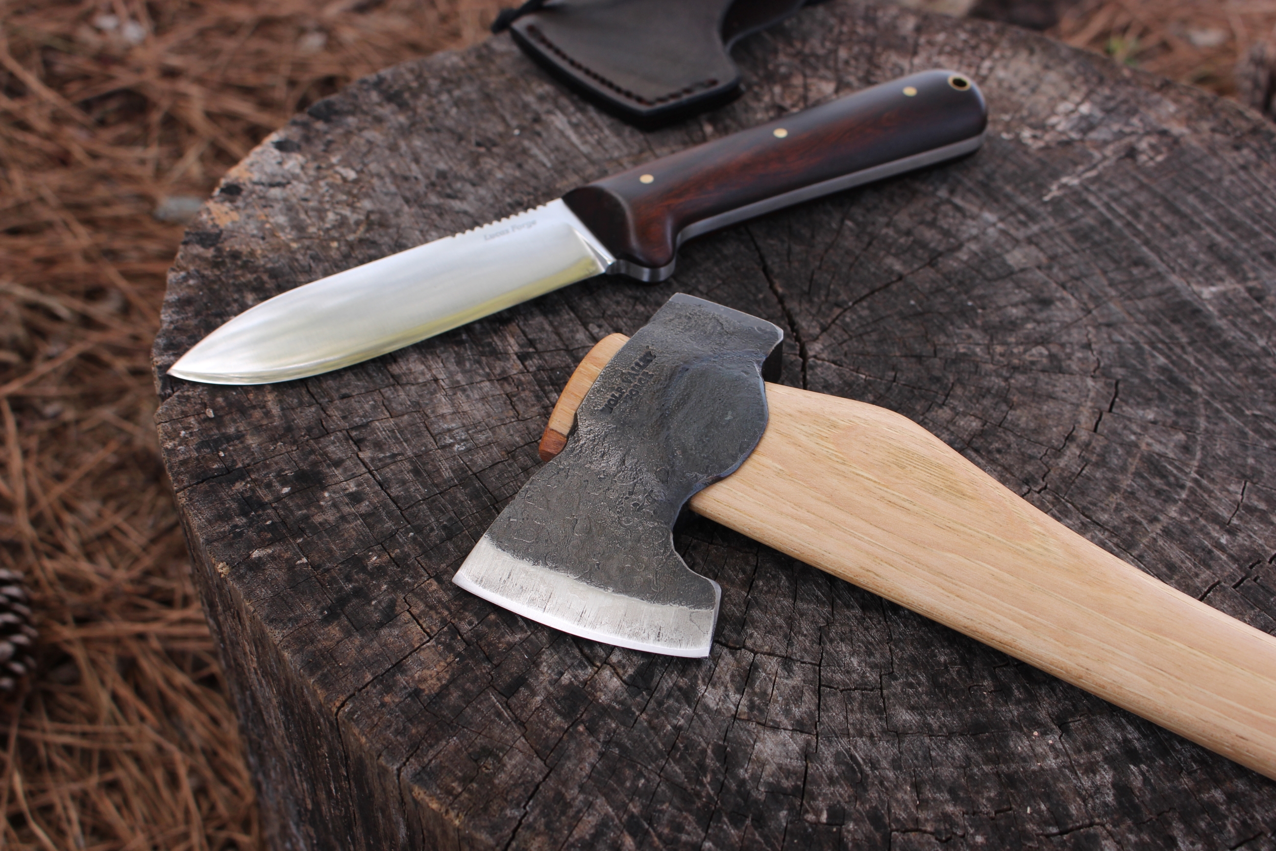 handmade, usa made, usa made axe, hatchet, chopping, wood chopping, outdoor, outdoorsman, survival, backwoodsman, hickory, axe made in america, axes made in the usa, ike bullington, wolf valley forge, valley forge, pack axe, back packing, camping, trail axe, hunting axe, trappers axe, camp axe, bush axe, belt axe, pack axe, leather shoulder rig, chopping axe, leather axe carrier, shoulder sling for axe, carpenter's axe, Wolf Valley Forge, Wolf Valley Forge axe release, Axe Wax, haversack, go back, man purse, man bag, canvas bag, reenactor, reenacting, Trekker Axe, Axe Life