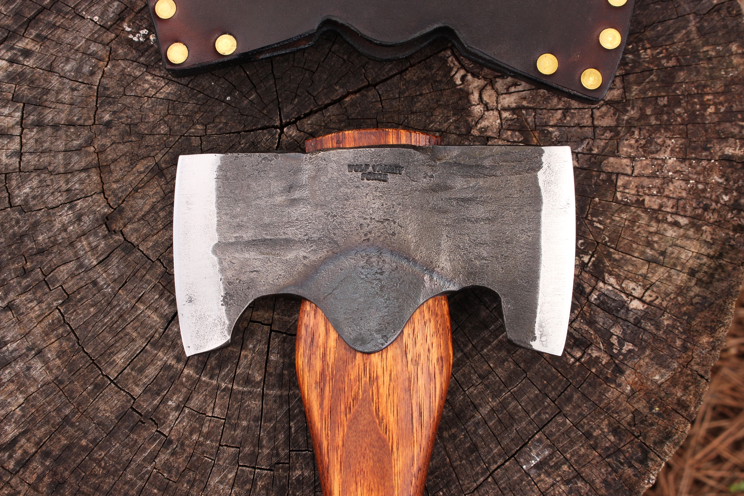 handmade, usa made, usa made axe, hatchet, chopping, wood chopping, outdoor, outdoorsman, survival, backwoodsman, hickory, axe made in america, axes made in the usa, ike bullington, nessmuk reproduction, wolf valley forge, valley forge, pack axe, back packing, camping, trail axe, hunting axe, trappers axe, camp axe, bush axe, belt axe, pack axe, leather shoulder rig, chopping axe, leather axe carrier, shoulder sling for axe, carpenter's axe, Wolf Valley Forge, Wolf Valley Forge axe release, Axe Wax, haversack, go bag, man purse, man bag, canvas bag, reenactor, reenacting, Trekker Axe, Axe Life, Splitting Wedge, Handforged, Wedge