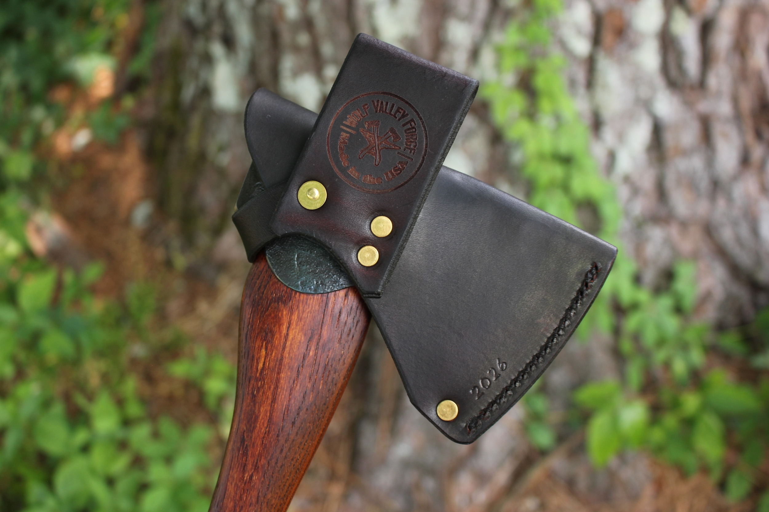handmade, usa made, usa made axe, hatchet, chopping, wood chopping, outdoor, outdoorsman, survival, backwoodsman, hickory, axe made in amera, axes made in the usa, ike bullington, wolf valley forge, valley forge, pack axe, back packing, camping, trail axe, hunting axe, trappers axe, camp axe, bush axe, belt axe, pack axe, leather shoulder rig, chopping axe, leather axe carrier, shoulder sling for axe, Carpenter's Axe, New Wolf Valley Forge Axe Release, WVF
