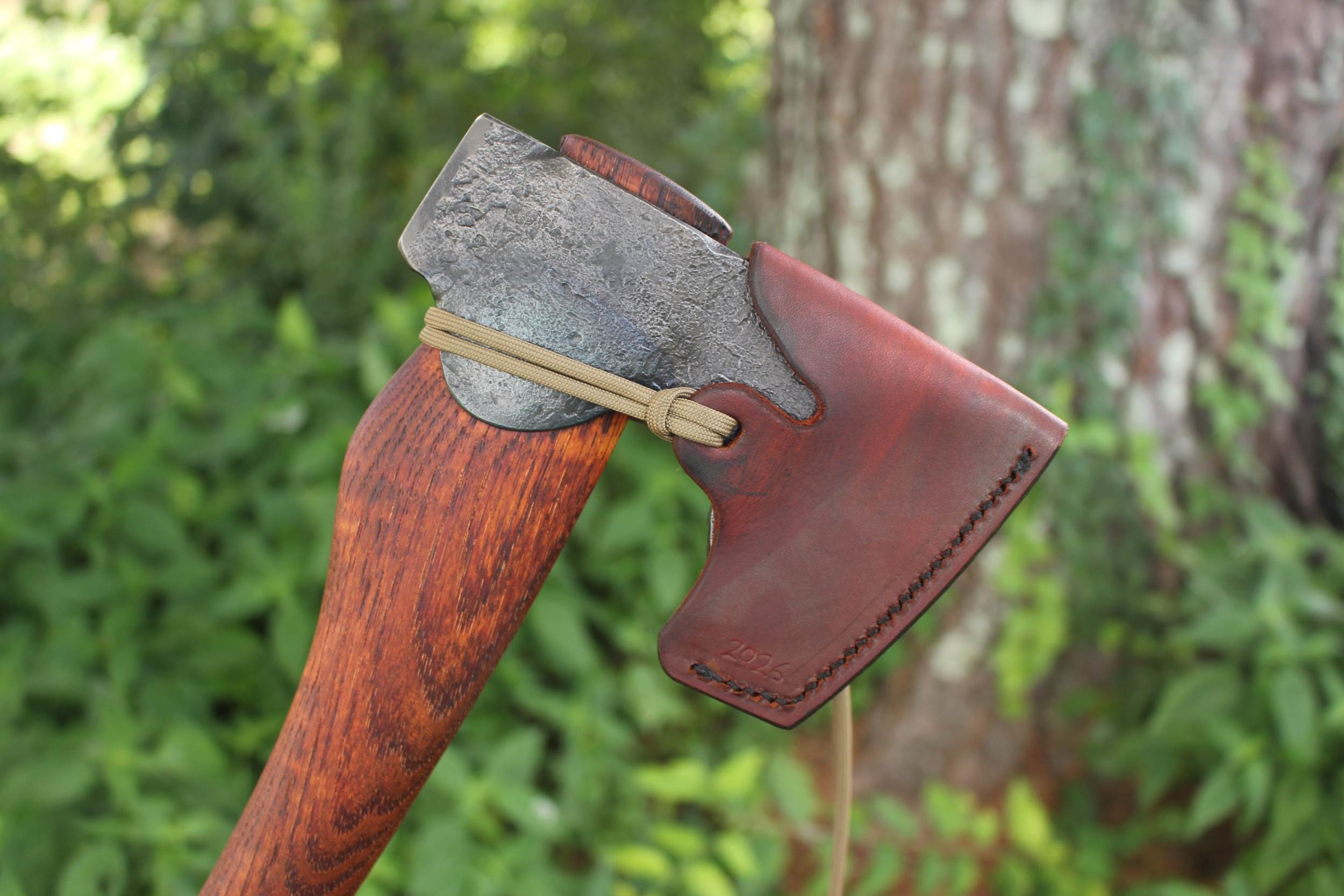 handmade, usa made, usa made axe, hatchet, chopping, wood chopping, outdoor, outdoorsman, survival, backwoodsman, hickory, axe made in america, axes made in the usa, ike bullington, wolf valley forge, valley forge, pack axe, back packing, camping, trail axe, hunting axe, trappers axe, camp axe, bush axe, belt axe, pack axe, leather shoulder rig, chopping axe, leather axe carrier, shoulder sling for axe, carpenter's axe, Wolf Valley Forge, Wolf Valley Forge axe release, Axe Wax, haversack, go back, man purse, man bag, canvas bag, reenactor, reenacting