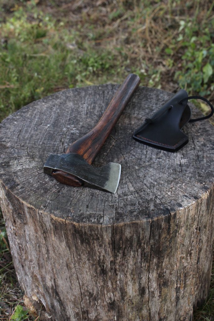 handmade, usa made, usa made axe, hatchet, chopping, wood chopping, outdoor, outdoorsman, survival, backwoodsman, hickory, axe made in america, axes made in the usa, ike bullington, wolf valley forge, valley forge, pack axe, back packing, camping, trail axe, hunting axe, trappers axe, camp axe, bush axe, belt axe, pack axe, leather shoulder rig, chopping axe, leather axe carrier, shoulder sling for axe, carpenter's axe, Wolf Valley Forge, Wolf Valley Forge axe release, Axe Wax, haversack, go back, man purse, man bag, canvas bag, reenactor, reenacting