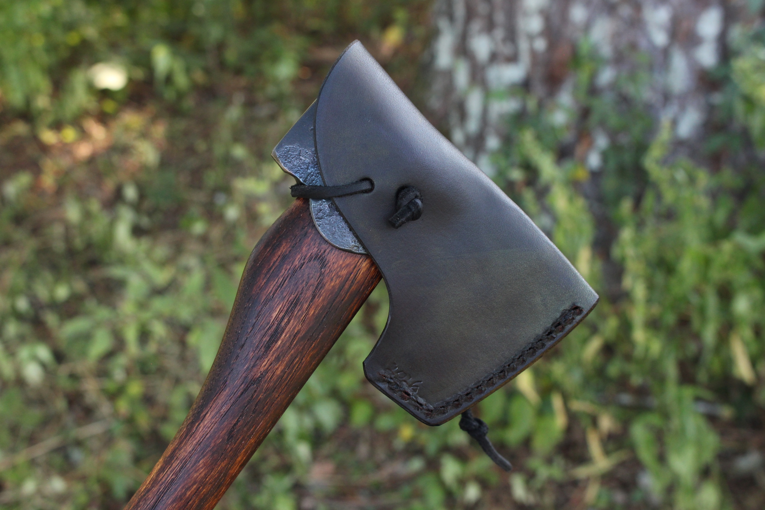 handmade, usa made, usa made axe, hatchet, chopping, wood chopping, outdoor, outdoorsman, survival, backwoodsman, hickory, axe made in america, axes made in the usa, ike bullington, wolf valley forge, valley forge, pack axe, back packing, camping, trail axe, hunting axe, trappers axe, camp axe, bush axe, belt axe, pack axe, leather shoulder rig, chopping axe, leather axe carrier, shoulder sling for axe, carpenter's axe, Wolf Valley Forge, Wolf Valley Forge axe release, Axe Wax, haversack, go back, man purse, man bag, canvas bag, reenactor, reenacting
