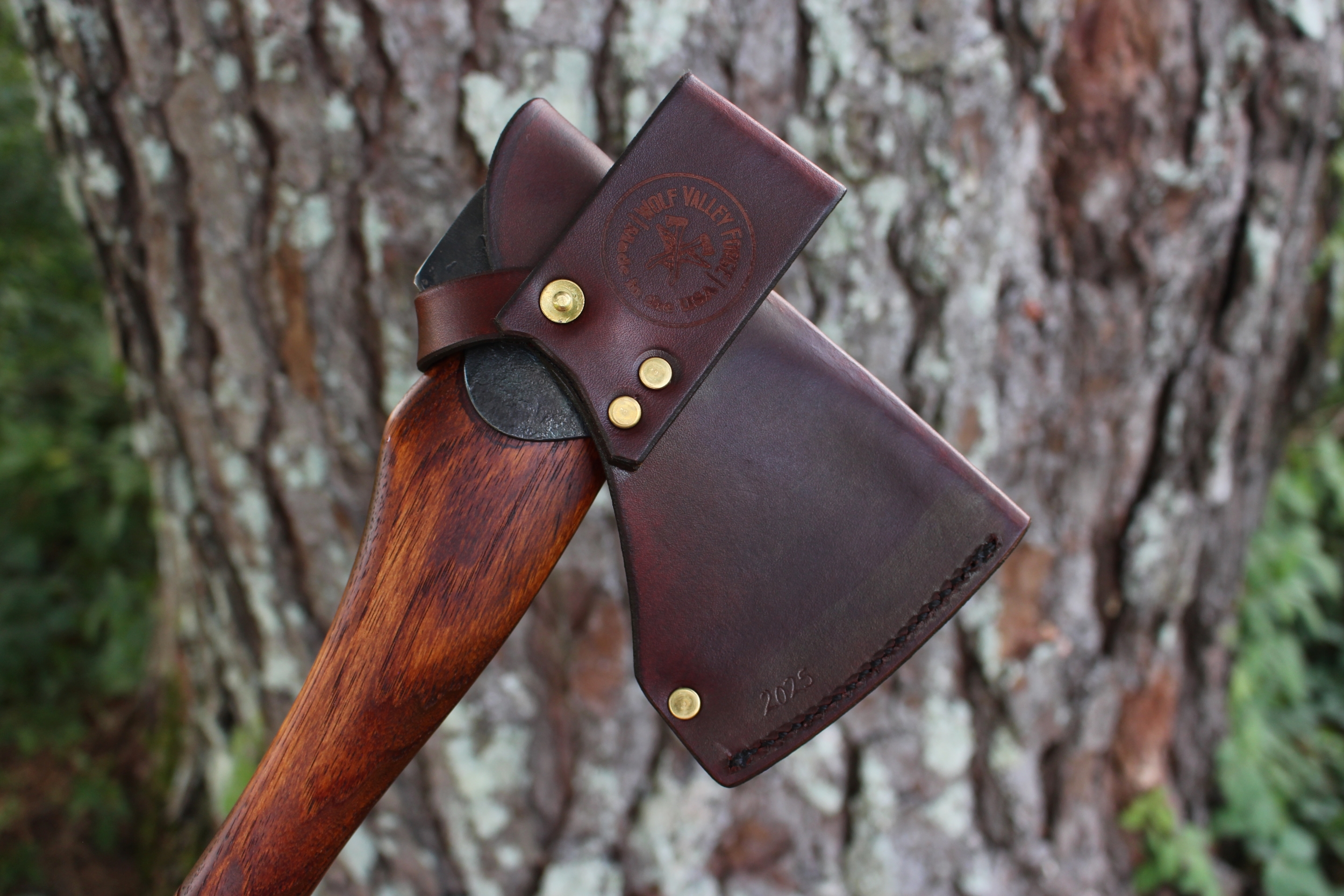 handmade, usa made, usa made axe, hatchet, chopping, wood chopping, outdoor, outdoorsman, survival, backwoodsman, hickory, axe made in america, axes made in the usa, ike bullington, wolf valley forge, valley forge, pack axe, back packing, camping, trail axe, hunting axe, trappers axe, camp axe, bush axe, belt axe, pack axe, leather shoulder rig, chopping axe, leather axe carrier, shoulder sling for axe, carpenter's axe, Wolf Valley Forge, Wolf Valley Forge axe release, Axe Wax, haversack, go back, man purse, man bag, canvas bag, reenactor, reenacting