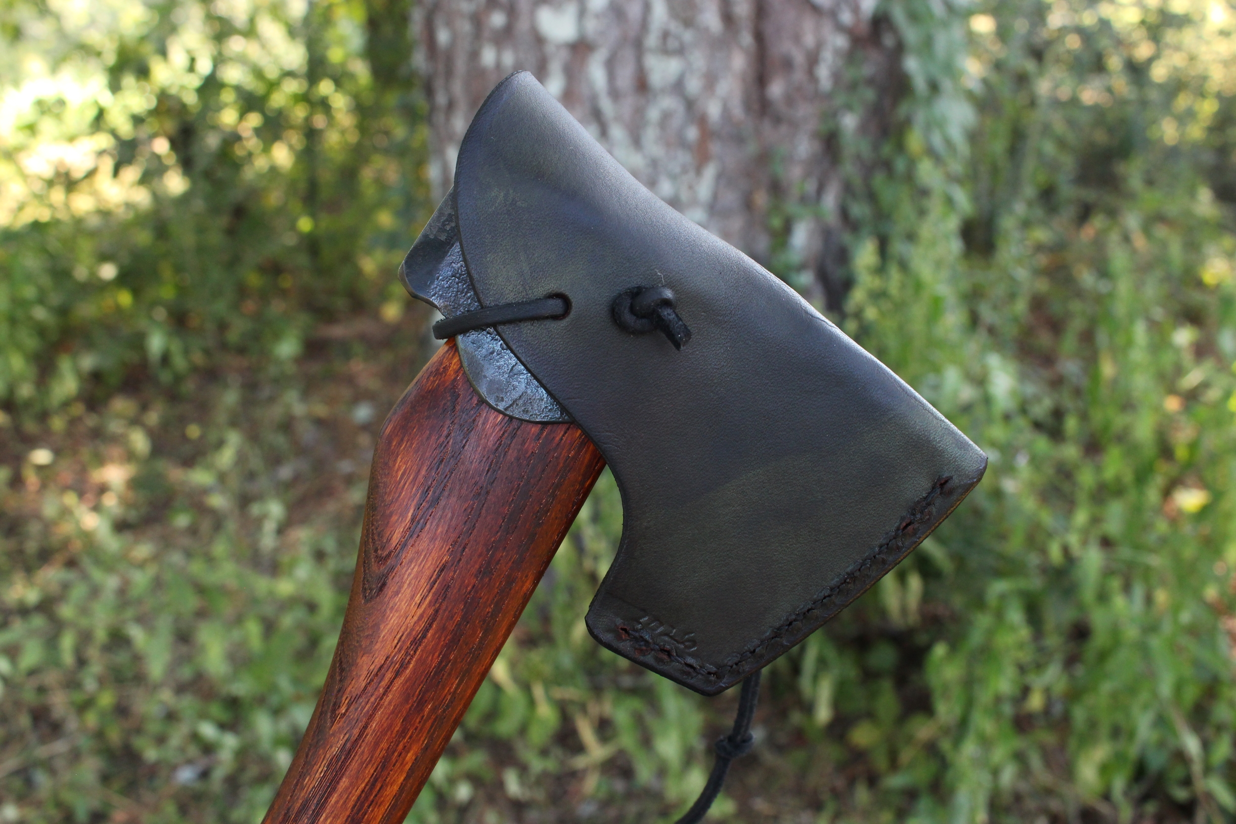handmade, usa made, usa made axe, hatchet, chopping, wood chopping, outdoor, outdoorsman, survival, backwoodsman, hickory, axe made in america, axes made in the usa, ike bullington, wolf valley forge, valley forge, pack axe, back packing, camping, trail axe, hunting axe, trappers axe, camp axe, bush axe, belt axe, pack axe, leather shoulder rig, chopping axe, leather axe carrier, shoulder sling for axe, carpenter's axe, Wolf Valley Forge, Wolf Valley Forge axe release, Axe Wax, haversack, go back, man purse, man bag, canvas bag, reenactor, reenacting
