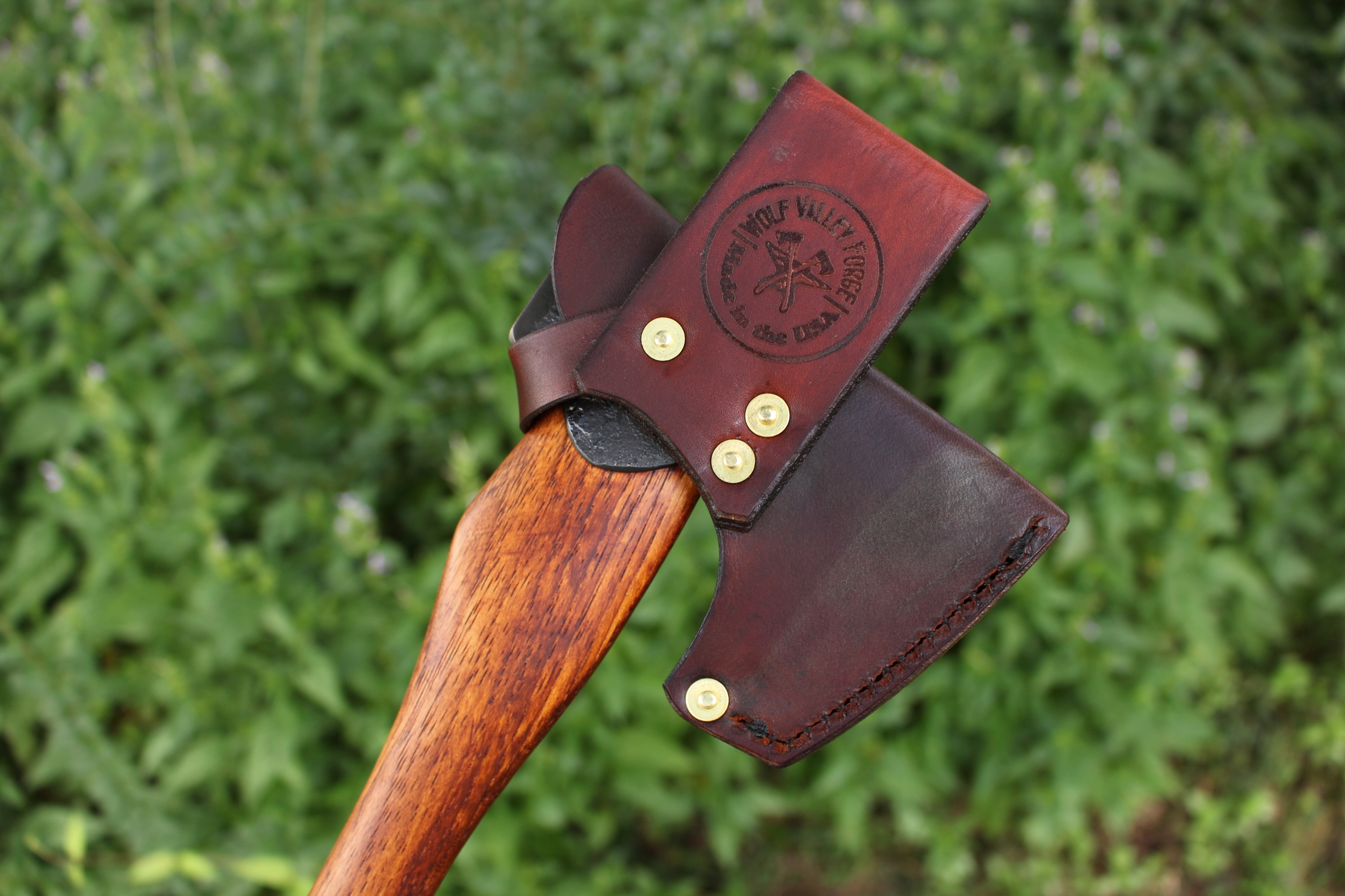 handmade, usa made, usa made axe, hatchet, chopping, wood chopping, outdoor, outdoorsman, survival, backwoodsman, hickory, axe made in america, axes made in the usa, ike bullington, wolf valley forge, valley forge, pack axe, back packing, camping, trail axe, hunting axe, trappers axe, camp axe, bush axe, belt axe, pack axe, leather shoulder rig, chopping axe, leather axe carrier, shoulder sling for axe, carpenter's axe, Wolf Valley Forge, Wolf Valley Forge axe release, Axe Wax, haversack, go back, man purse, man bag, canvas bag, reenactor, reenacting