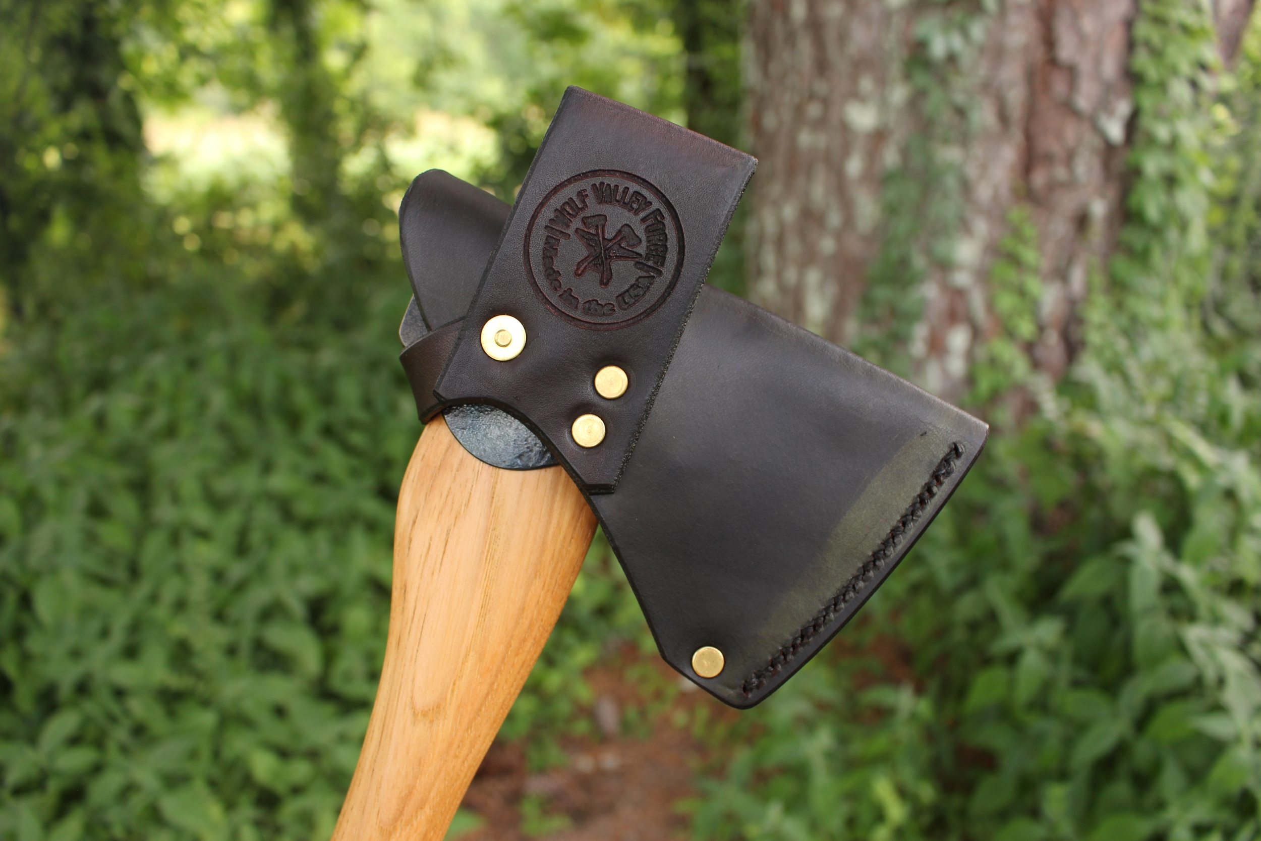 handmade, usa made, usa made axe, hatchet, chopping, wood chopping, outdoor, outdoorsman, survival, backwoodsman, hickory, axe made in america, axes made in the usa, ike bullington, wolf valley forge, valley forge, pack axe, back packing, camping, trail axe, hunting axe, trappers axe, camp axe, bush axe, belt axe, pack axe, leather shoulder rig, chopping axe, leather axe carrier, shoulder sling for axe, carpenter's axe, Wolf Valley Forge, Wolf Valley Forge axe release, Axe Wax, haversack, go back, man purse, man bag, canvas bag, reenactor, reenacting